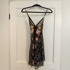 FREE PEOPLE sheer embroidered slip dress.